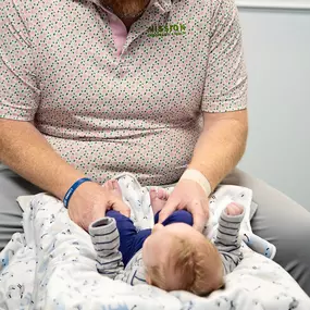 Dr. Zuidema treating an infant chiropractic  patient