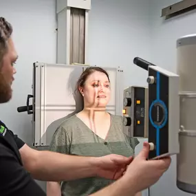 Dr. Zuidema taking the x-ray of a patient