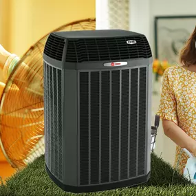 An outdoor air conditioning unit is running at full power as people nearby try to stay cool in the heat. One person wipes sweat from their forehead, another fans themselves, and a third reaches for a cold drink—clearly struggling with high indoor temperatures. The scene emphasizes the need for reliable air conditioning, timely A/C repair, or a new energy-efficient cooling system. Ideal for use in content promoting residential or commercial HVAC services, air conditioner maintenance, or summer co
