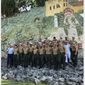 Vermont Army National Guard in front of Battle of Montese mural