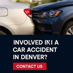A wide-angle shot showing a car accident scene in Denver with police presence and bystanders, highlighting the need for legal support.