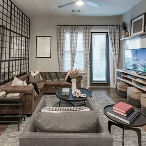 A living room with a couch and a tv