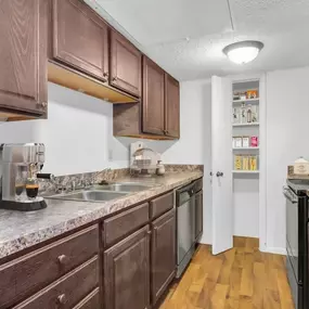 A kitchen with a pantry