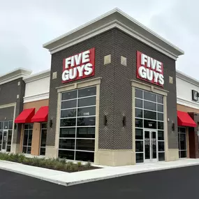 Exterior photograph of the Five Guys restaurant at 1146 North Emerson Avenue in Greenwood, Indiana.