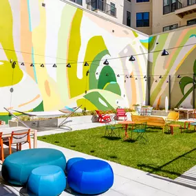 A colorful mural on the wall of a building.