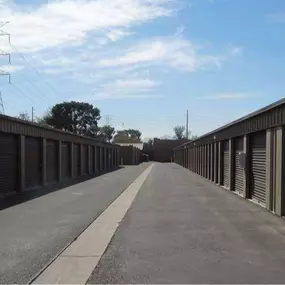 Convenient drive-up storage units at River Crossing Storage & RV in Goodyear, AZ, featuring wide driveways for effortless loading and unloading directly from your vehicle.