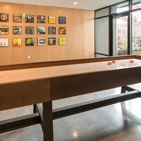 The Hub - resident lounge with shuffleboard & TV