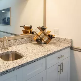 A kitchen counter with a sink