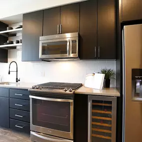 Modern Kitchen with Appliances at Dylan at RiNo, Colorado