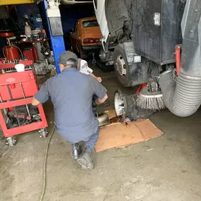 I & F Transmission Specialist mechanic working