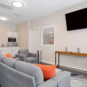 Renovated and upgraded living rooms with vinyl flooring throughout.