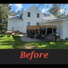 This photo shows the exterior of a home in Jordan, Minnesota before Gehlen Construction installed new siding. The existing siding was worn and outdated, offering minimal protection and curb appeal.
