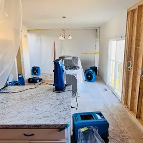 Team from First Response Restoration of RGV restoring a water-damaged kitchen in the Rio Grande Valley with dehumidifiers and fans. This image showcases our 24/7 flood and water damage restoration services in McAllen, Brownsville, and beyond. IICRC certified (#70221362). Call (956) 305-4229 for immediate help.