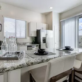 Fitted Kitchen With Island Dining at Avilla Canyon