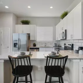 Fitted Kitchen With Island Dining