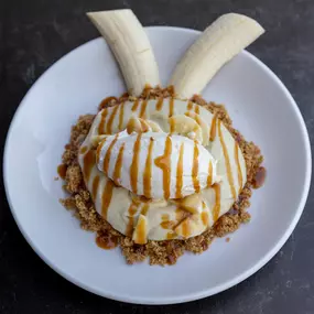 Banana Cream Pie | toasted nut crust, banana custard, fresh bananas, topped with whipped cream
