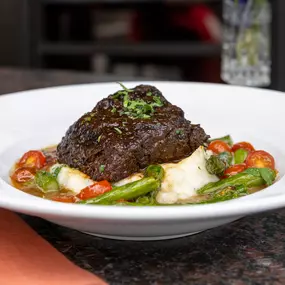 Braised Beef Short Rib | garlic mashed, asparagus, blistered tomatoes & braising jus