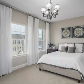 Primary bedroom at Essence at Elms Glen Townhomes