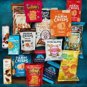 Wholesale snack variety with chips, crisps, popcorn, and plant-based options perfect for retail shelves.
