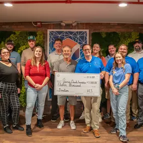 VCS Group Charity Check For Jamie Daniels Foundation