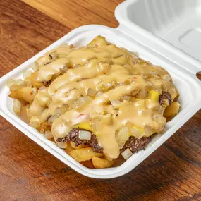 100% all beef burger chopped up with American cheese, grilled onions and house sauce served on fries