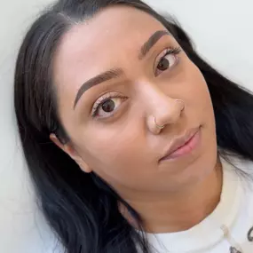 An image showing flawless combination brows in Riverton, Utah, with nano hair strokes at the front blending seamlessly into soft ombré shading.