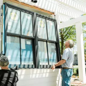 installing a Pella replacement window in Seattle