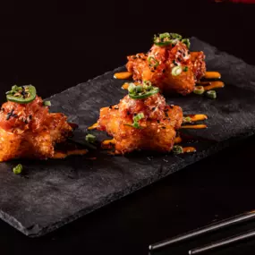 Three light and crispy rice stars, topped with our signature spicy tuna, sliced jalapenos, ponzu, and spicy mayo. Finished with our house-made RNR hot honey, toasted sesame seeds and green onions.