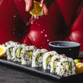 Fresh lump blue crab meat rolled with creamy avocado and crisp cucumber, finished with a dusting of toasted sesame seeds. Perfect with a squeeze of lemon.