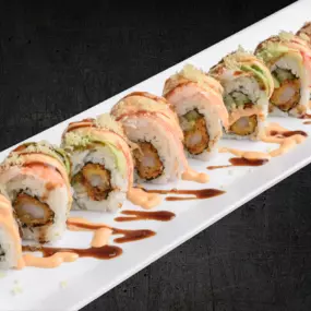 Shrimp tempura and cucumber inside,shrimp, krab stick and avocado outside—Hollywood-style. Topped with spicy mayo, eel sauce and crunchy flakes.