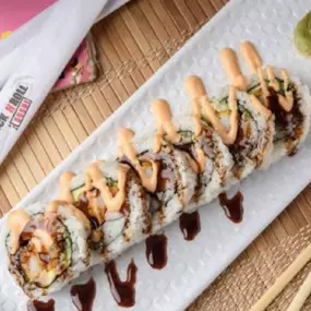 Shrimp tempura, krab stick, cucumber, avocado inside, topped with spicy mano and eel sauce.