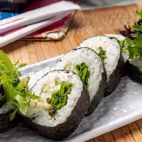 Cucumber, avocado, spring mix inside.