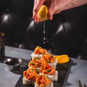 Tempura fried kanikama stick and shredded krab inside, topped with spicy lobster claw salad. Served with a lemon wedge for an added bite!
