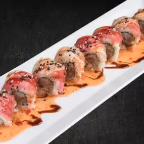 Yellowtail and spicy mayo inside, red tuna and krab stick outside, topped with sweet chili, eel sauce and sesame seeds.