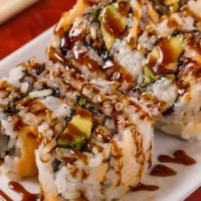 Baked eel and avocado inside, topped with eel sauce.