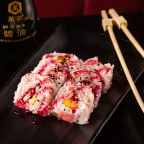 Soy paper, fresh mango and strawberry inside, topped with blueberry REAL’ syrup.