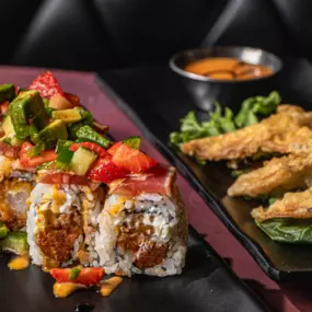 Choose any Headliner Roll and your choice of three Crispy Crab Wontons, one Egg Roll or Fried Rice (add Chicken, Shrimp or Filet Mignon to your Fried Rice for an additional charge.)