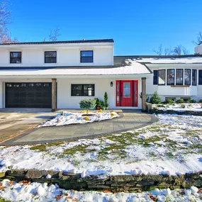 Exterior renovation, siding, front door, windows, garage, paver walkway