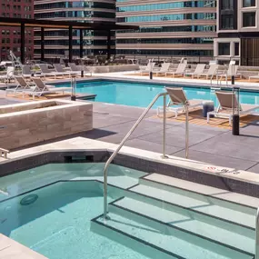 Swimming Pool And Relaxing Area with a hot tub
