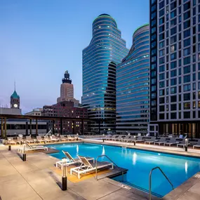 Rooftop pool with lounge chairs