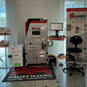 Nakamura-Tome CNC equipment displayed prominently in the Corona showroom, demonstrating advanced multitasking capabilities.