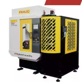 The Methods Plus-K60 Automation System enhances a medium bed FANUC RoboDrill with robotic tool and part exchange. With a compact 32