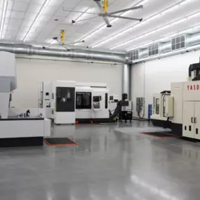 Inside the Methods Machine Tools Acton, MA facility, showcasing a clean, state-of-the-art environment with CNC machines from Yasda and Nakamura-Tome.