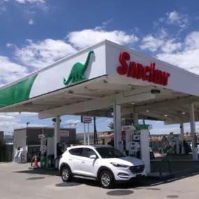 Sinclair gas station with fueling island