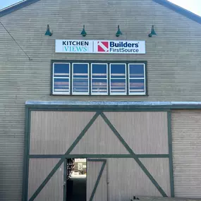 Builders FirstSource sign on warehouse in Warwick