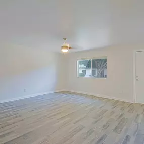 Unfurnished room with wooden floor