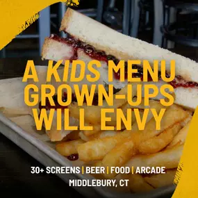 A gooey peanut butter and jelly sandwich served with fries on a tray, accompanied by a bold headline: “A Kids Menu Grown-Ups Will Envy.