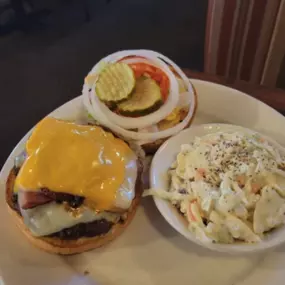 This one's a treat! the 513 Deli Burger starts with an all-beef patty blackened with our 513 Sauce. Then we add grilled ham and three cheeses: Pepper jack, American and Swiss. We finish it with sauteed onions. Dave says, 