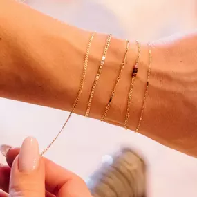 permanent jewelry bracelet stack