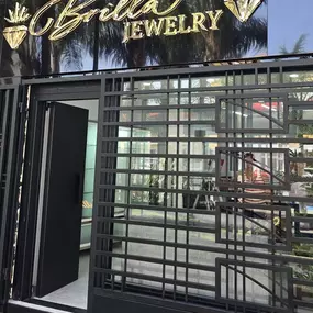The Brilla Jewelry store exterior features a stylish black facade with a prominent 